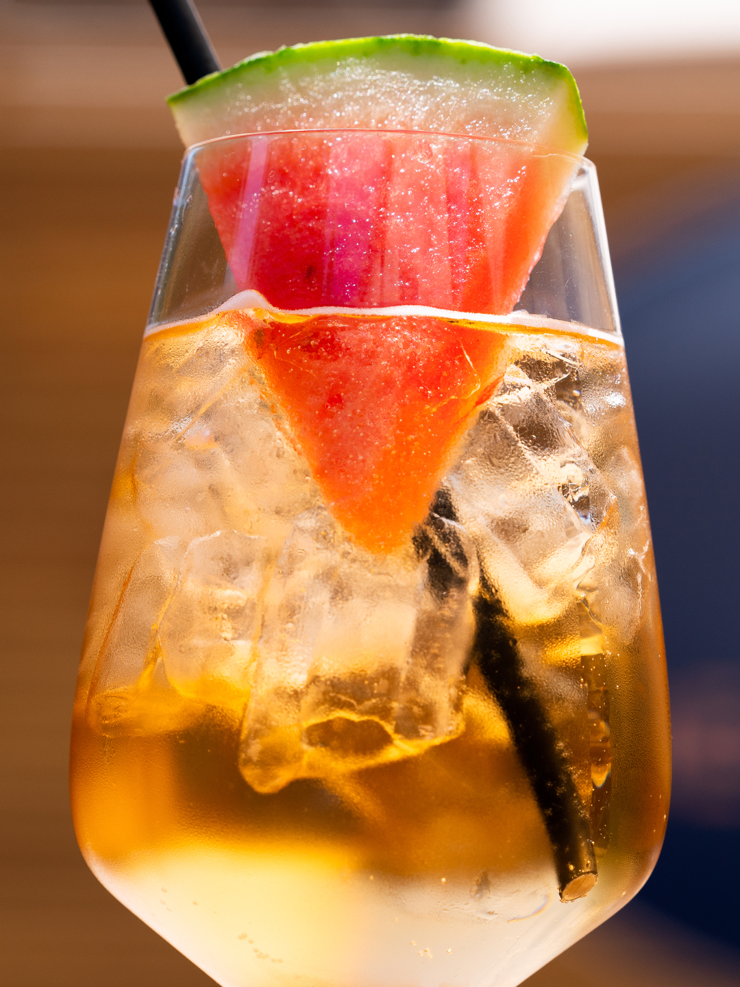 Melonade spritz with watermelon syrup and peach liqueur.