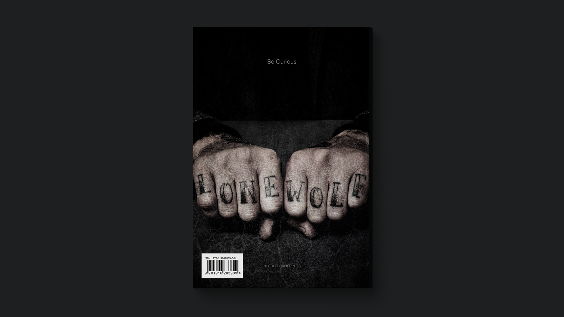 Book cover design featuring tattooed knuckles with the words Lone Wolf.