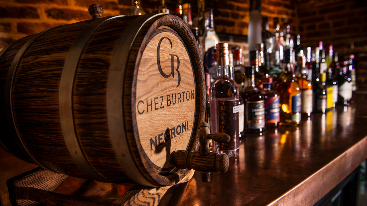 An oak drinks barrel featuring the Chez Burton brand design.