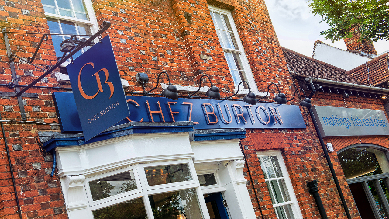 Signage design for Chez Burton restaurant in Baldock featuring a swing sign.