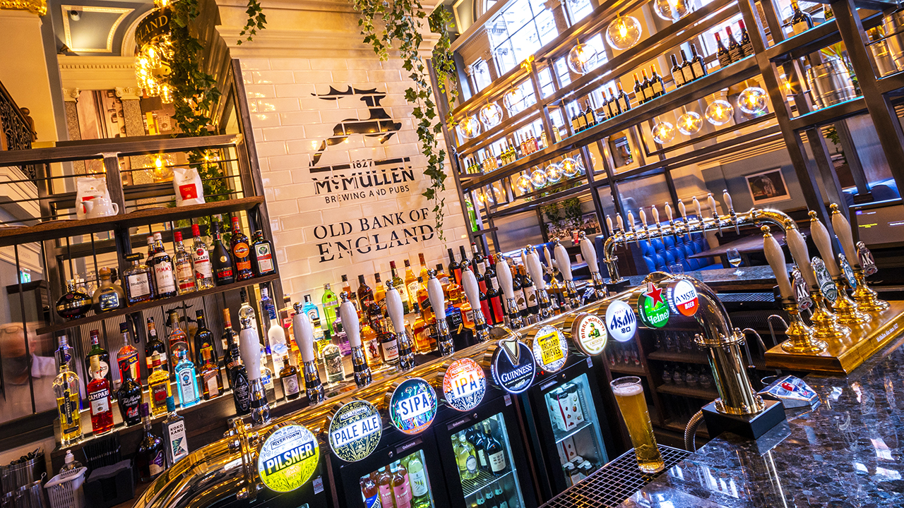 Beer pumps at McMullen's renovated Old Bank Of England bar in London, 2022.